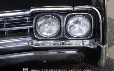 Oldsmobile-Starfire-1966-Black-Black-and-White-17