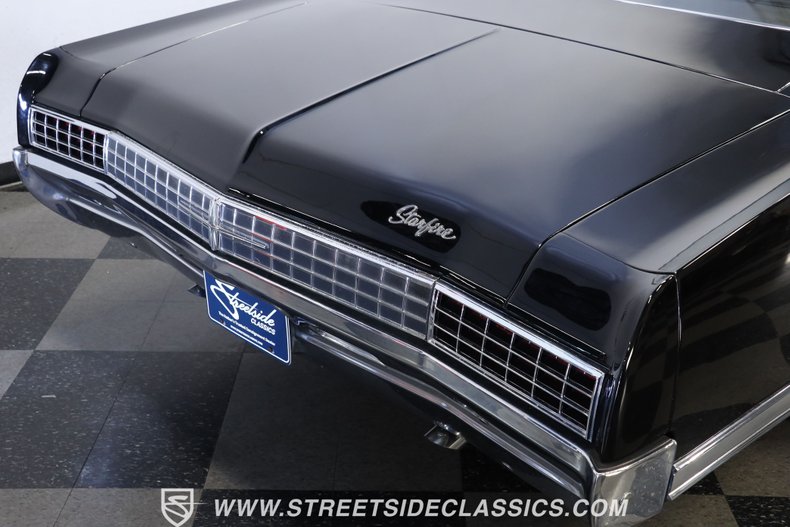 Oldsmobile-Starfire-1966-Black-Black-and-White-21