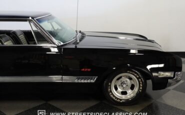 Oldsmobile-Starfire-1966-Black-Black-and-White-25