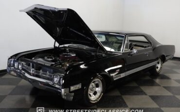 Oldsmobile-Starfire-1966-Black-Black-and-White-26