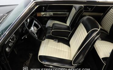 Oldsmobile-Starfire-1966-Black-Black-and-White-29