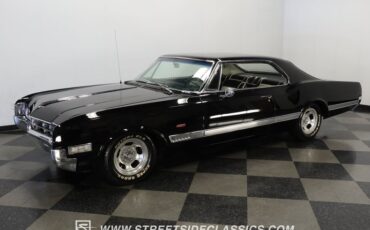 Oldsmobile-Starfire-1966-Black-Black-and-White-3