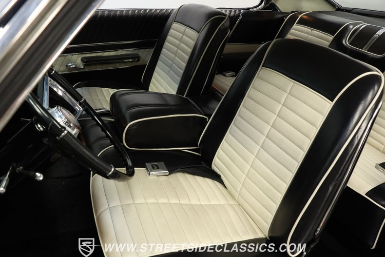 Oldsmobile-Starfire-1966-Black-Black-and-White-35