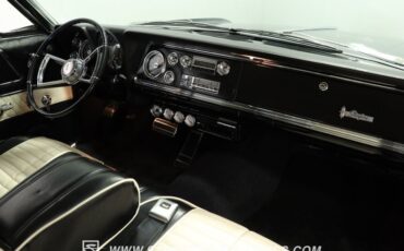 Oldsmobile-Starfire-1966-Black-Black-and-White-40