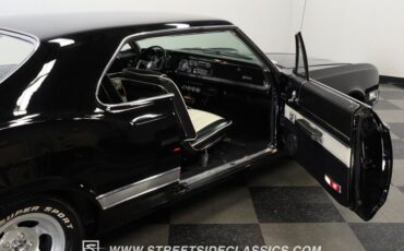 Oldsmobile-Starfire-1966-Black-Black-and-White-44