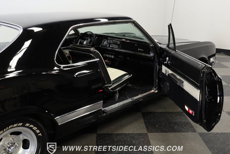 Oldsmobile-Starfire-1966-Black-Black-and-White-44