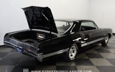Oldsmobile-Starfire-1966-Black-Black-and-White-45