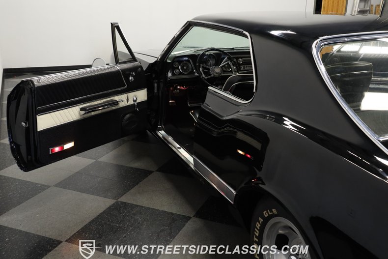 Oldsmobile-Starfire-1966-Black-Black-and-White-49