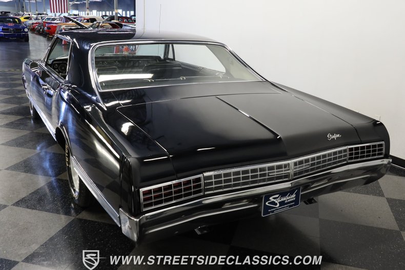 Oldsmobile-Starfire-1966-Black-Black-and-White-5