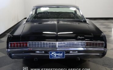Oldsmobile-Starfire-1966-Black-Black-and-White-6