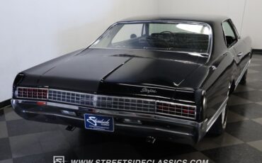 Oldsmobile-Starfire-1966-Black-Black-and-White-7