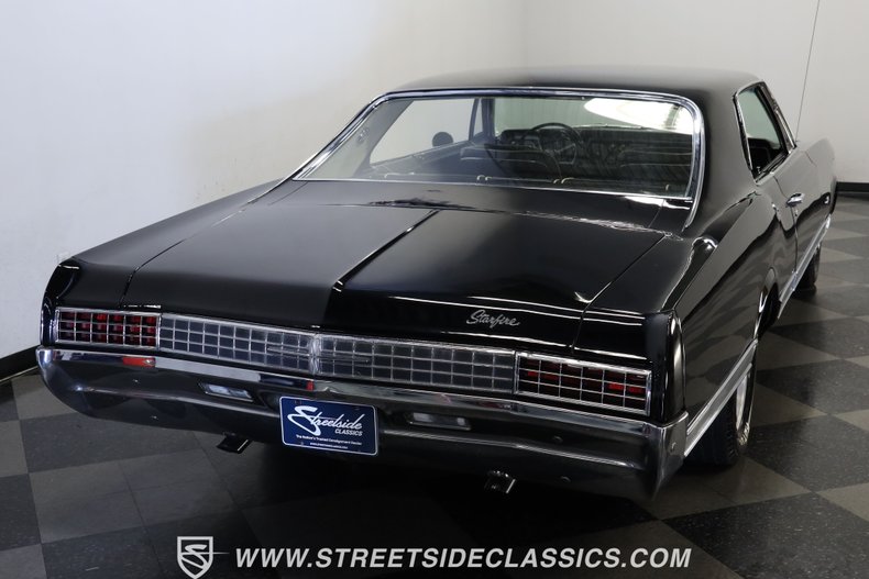 Oldsmobile-Starfire-1966-Black-Black-and-White-7