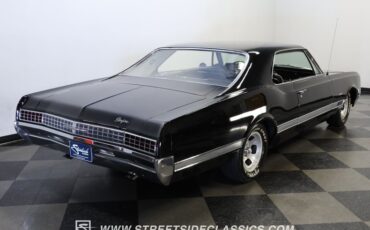 Oldsmobile-Starfire-1966-Black-Black-and-White-8