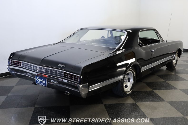 Oldsmobile-Starfire-1966-Black-Black-and-White-8