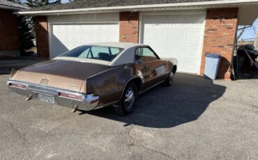 Oldsmobile-Toronado-1970-Brown-Brown-1