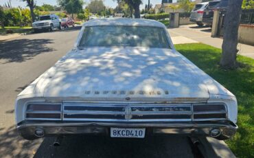 Oldsmobile-cutlass-1964-white-2