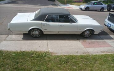 Oldsmobile-cutlass-1966-white-2