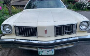 Oldsmobile-cutlass-1975-yellow-1