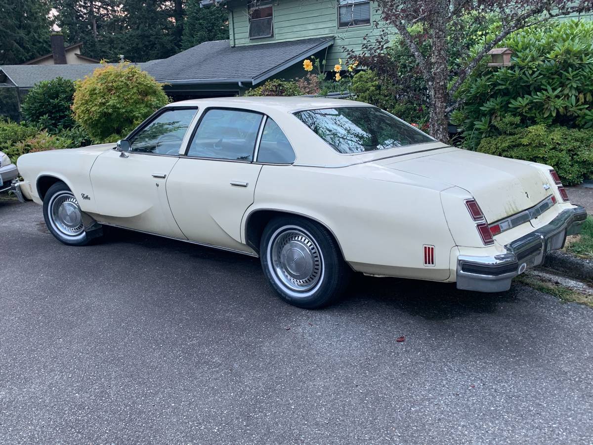 Oldsmobile-cutlass-1975-yellow-2