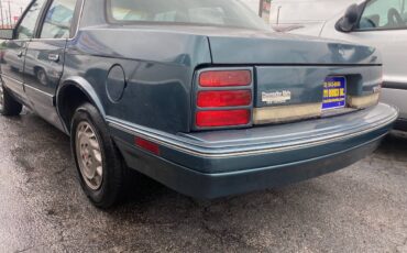 Oldsmobile-cutlass-ciera-1996-green-47