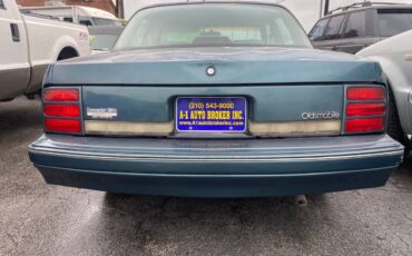 Oldsmobile-cutlass-ciera-1996-green-55