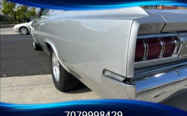 Oldsmobile-cutlass-f85-1964-silver-11