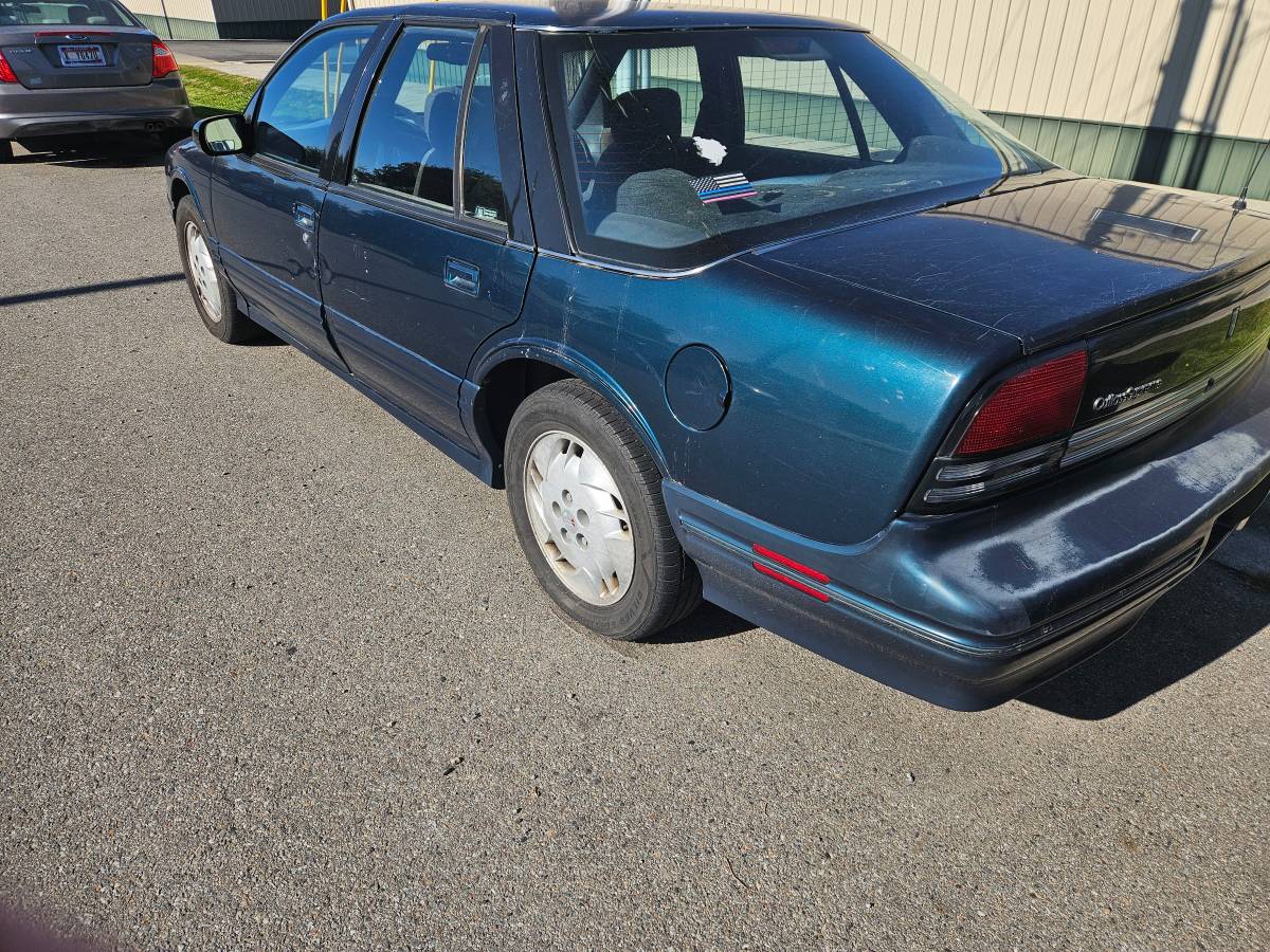 Oldsmobile-cutlass-supreme-1995-green-1