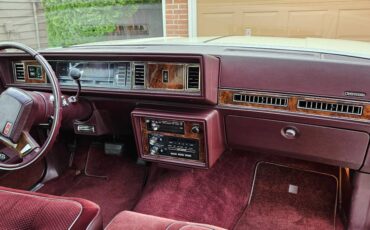 Oldsmobile-cutlass-supreme-brougham-1985-yellow-12