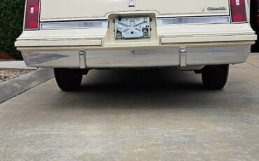 Oldsmobile-cutlass-supreme-brougham-1985-yellow-4