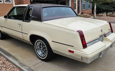 Oldsmobile-cutlass-supreme-brougham-1985-yellow-5