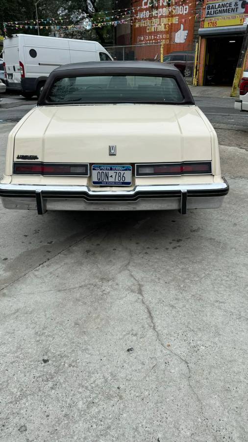 Oldsmobile-toronado-1980-yellow-5