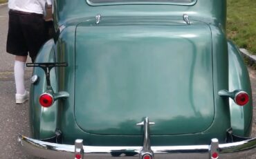 Packard-115c-1937-Coachman-Green-Tan-11