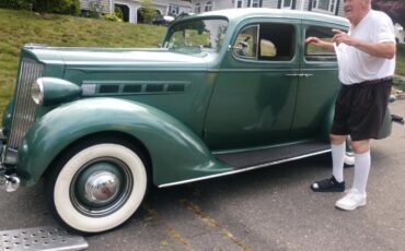 Packard-115c-1937-Coachman-Green-Tan-15