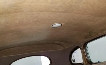 Packard-115c-1937-Coachman-Green-Tan-17