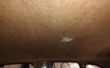 Packard-115c-1937-Coachman-Green-Tan-19