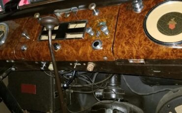 Packard-115c-1937-Coachman-Green-Tan