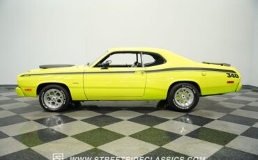 Plymouth-Duster-1973-Light-Green-Black-15