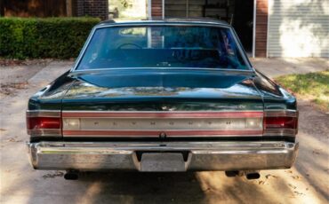Plymouth-Gtx-1967-Dark-Green-Poly-Black-1