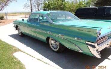 Pontiac-Bonneville-1959-Jade-Mist-Metallic-Tri-Color-Green-4
