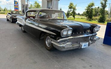 Pontiac-laurentian-four-door-sport-1958-black