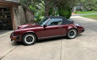 Porsche-911-1983-Ruby-Red-Metallic-Tan-4