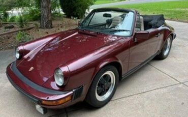 Porsche-911-1983-Ruby-Red-Metallic-Tan-5