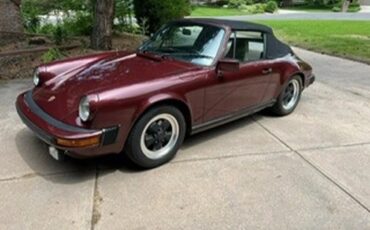 Porsche-911-1983-Ruby-Red-Metallic-Tan-7