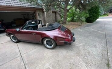 Porsche-911-1983-Ruby-Red-Metallic-Tan-8