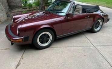Porsche-911-1983-Ruby-Red-Metallic-Tan-9