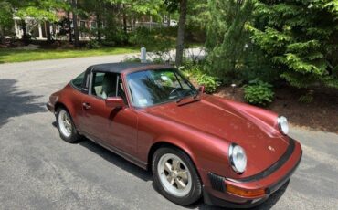 Porsche-911-1986-Garnet-Red-Metallic-Beige