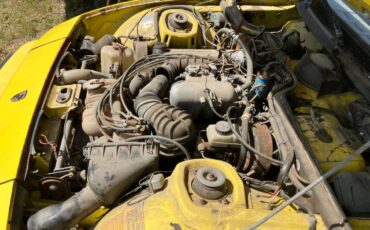 Porsche-924-1976-yellow-16