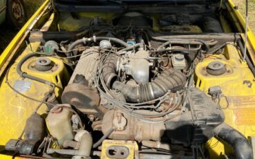 Porsche-924-1976-yellow-17
