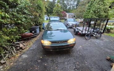Subaru-impreza-sport-wagon-1996-green-3