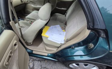 Subaru-impreza-sport-wagon-1996-green-7